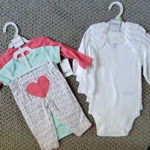 NWT. Carter's long sleeve onesies .